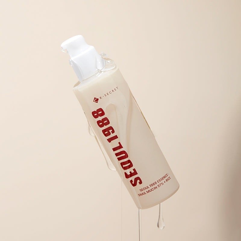 K-Secret Seoul 1988 Essence: Snail Mucin 97 % + Rice – veido esencija su mucinu 1